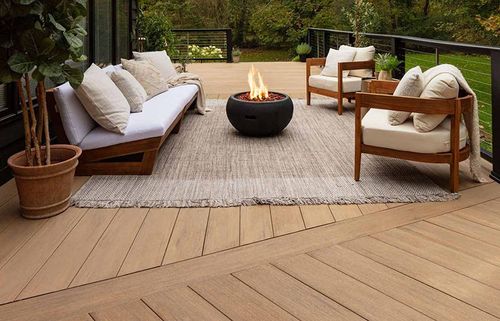 natural wood deck with black horizontal railings