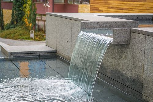 waterfall into shallow fountain