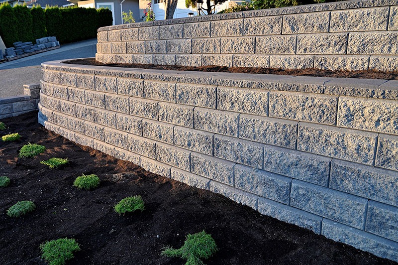 multi-tier retaining wall with plants